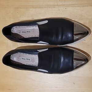 Miu Miu Black Leather Loaffers with Silver Cap Toe